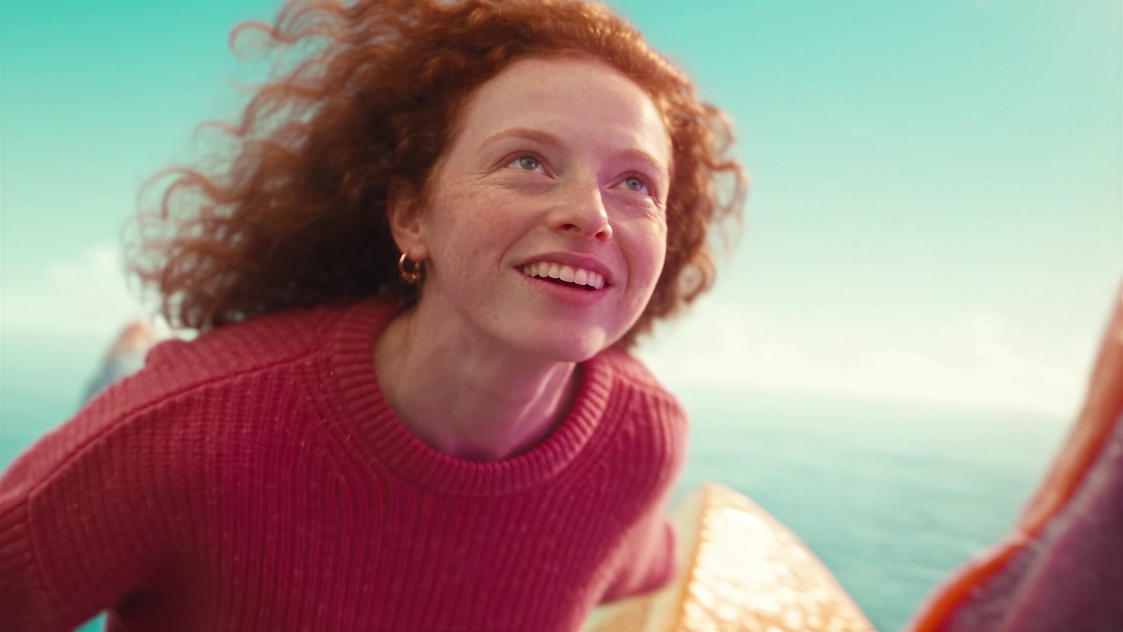 Character smiling in the wind — turquoise sky