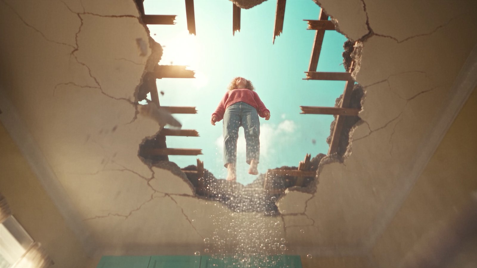 Rising through the broken ceiling into the sky