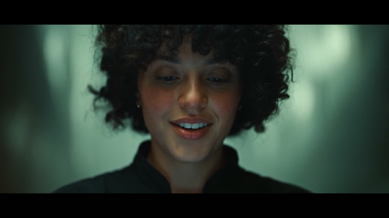 Chef character — a smile in the screen's glow